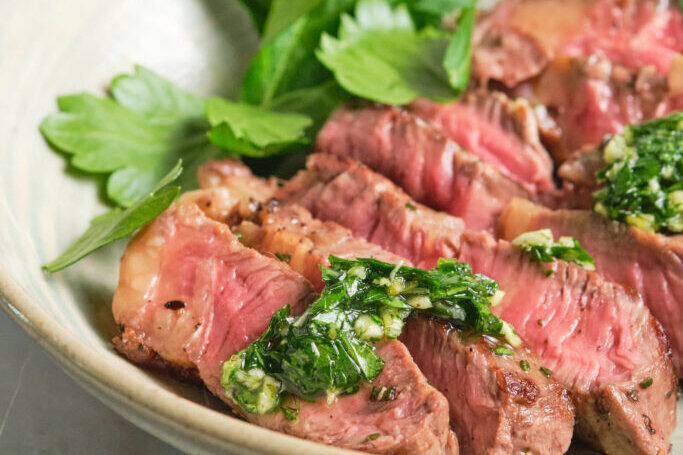 cut steak with garnish